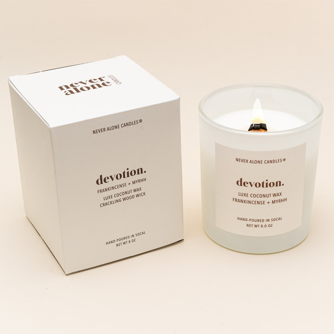 A candle scented with frankincense and myrrh hand poured in SoCal and made with only non toxic ingredients