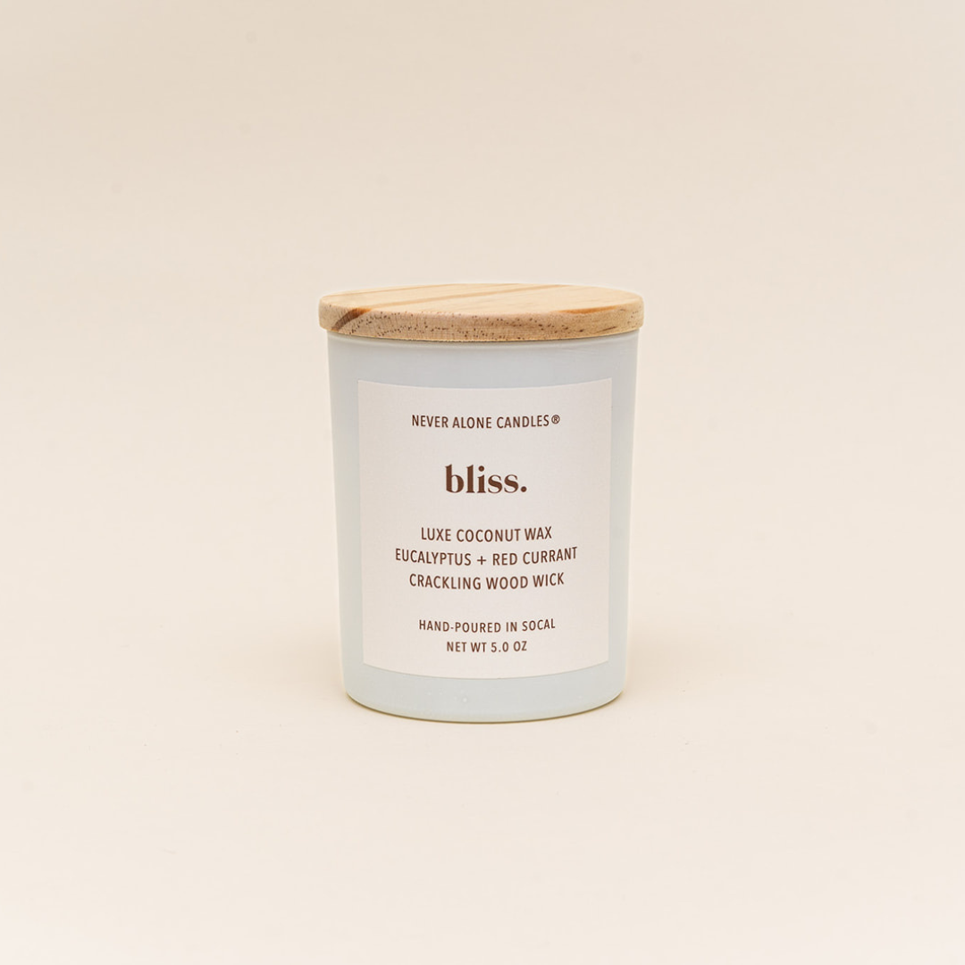 Eco-friendly luxury hand poured candles made with coconut wax, crackling wood wick scented with eucalyptus and red currant