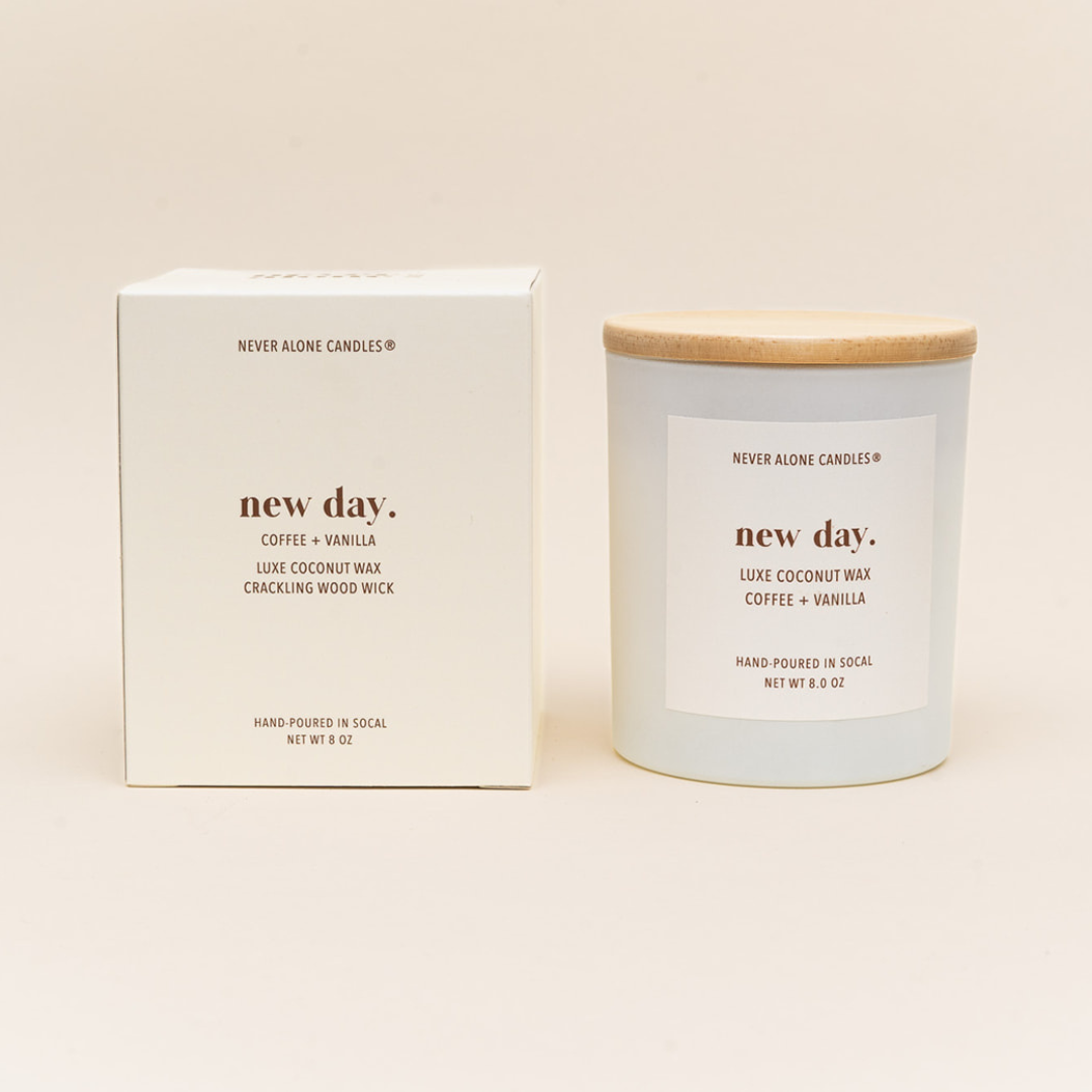 Luxury eco-friendly candle crafted from natural coconut wax, hand-poured in artisanal small batches, with a soothing crackling wood wick, exuding rich aromas of coffee, vanilla, and whiskey