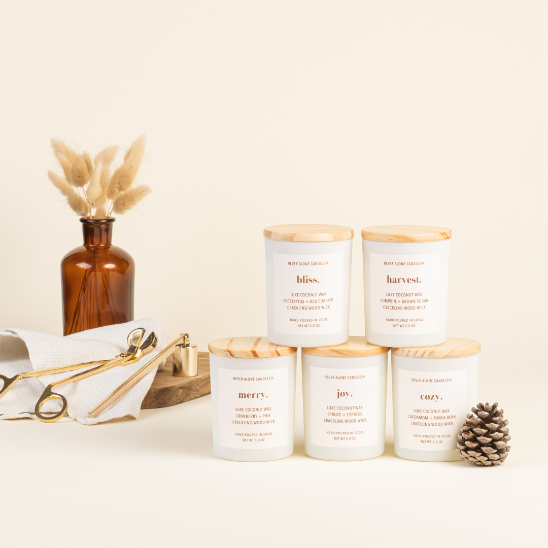 Fall and Christmas scented coconut wax candles with crackling wood wicks. Non toxic candles that don't give you a headache. 