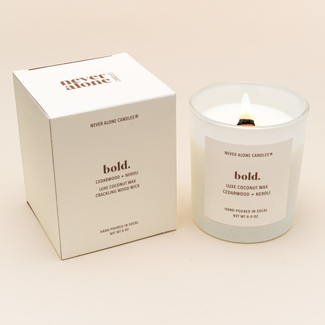Eco-friendly luxury candle made with natural coconut wax, hand-poured in small batches, featuring a long-lasting crackling wood wick and a fragrant blend of cedarwood and neroli
